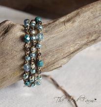 Load image into Gallery viewer, Handmade Women's Boho Wrap Crocheted Bead Wrap Bracelet in teal and brown. Triple wrap crocheted beaded bracelet. Crocheted bead necklace