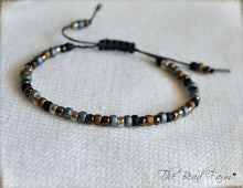 Load image into Gallery viewer, Adjustable Boho Hippie Seed Bead Bracelet in denim blue, gold, and black