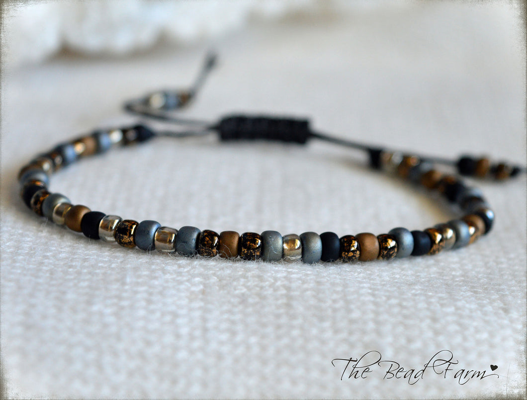 Adjustable Boho Hippie Seed Bead Bracelet in denim blue, gold, and black